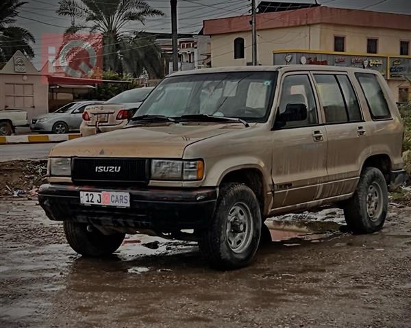 اسوزو تروبر 1998 للبيع في العراق - العلم